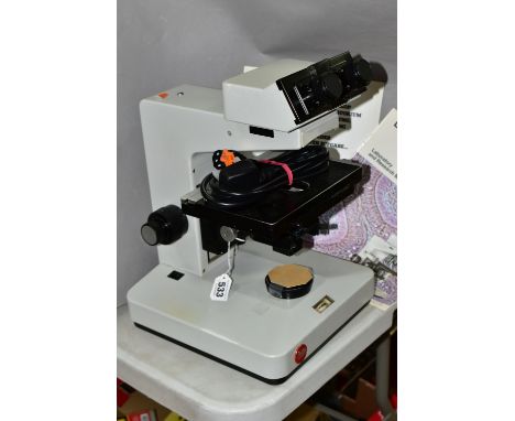 A LEITZ DIALUX 20 EB LABORATORY AND RESEARCH BINCOCULAR MICROSCOPE, with cable power supply and manual, untested (1)