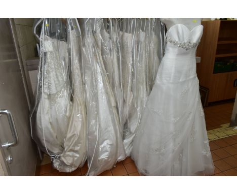 THIRTEEN WEDDING DRESSES, retail stock clearance (some may have marks or very light damage) varying in sizes and styles (12)