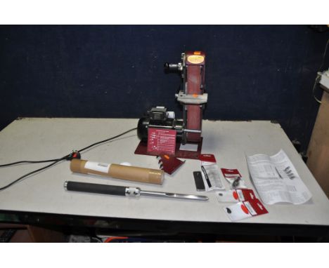 A ROBERT SORBY PRO EDGE TOOL SHARPENING BELT SANDER, a Sovreign gouge, Turnmaster RSTM head, Tip1 and Tip7 and a Box Scraper 