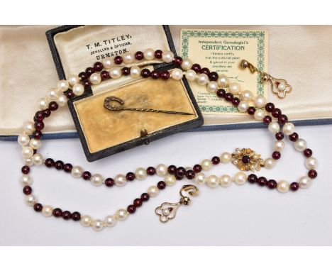 A CULTURED PEARL AND GARNET BEAD NECKLACE AND A PAIR OF EARRINGS, the necklace alternating between pearls and garnets, fitted