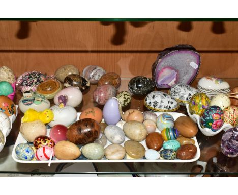 A LARGE COLLECTION OF MARBLE AND CERAMIC EGGS, comprising three Fabergé style eggs, sixteen stone/marble eggs, a pink Agate g