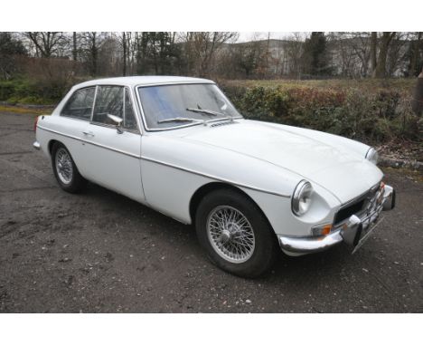 (PLEASE NOTE: 10% BUYERS PREMIUM FOR THIS LOT ONLY) A BRITISH CLASSIC MGB GT SPORTS CAR, mark lll, in white and silvered trim