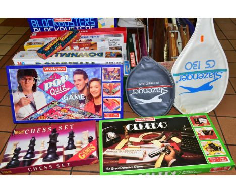 TWO BOXES AND LOOSE GAMES AND SPORTS EQUIPMENT, twelve boxed games to include Cluedo, Monopoly, Guess Who? and Blockbusters, 