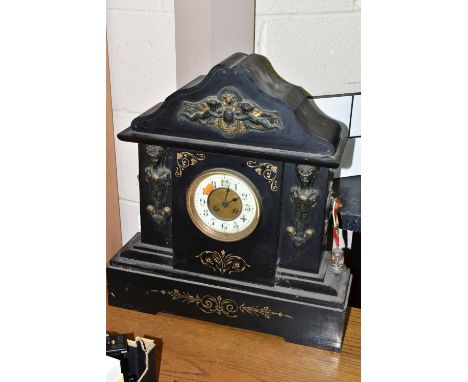 A BLACK SLATE MANTEL CLOCK, the unsigned dial having a uranium glass chapter ring with Arabic numeral hour markers, the movem