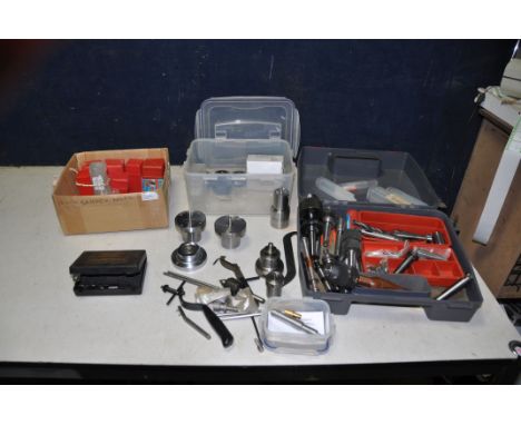 A CASE AND TWO TRAYS CONTAINING WOODLATHE ACCESSORIES AND TOOLS including twist grip and keys chucks with morse tapers, spike