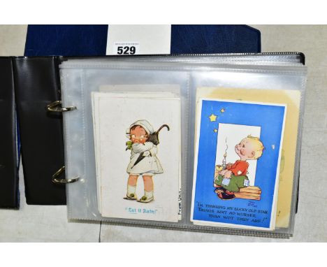 POSTCARDS, one album containing 129 early 20th century Postcards on a Children's theme featuring examples from Mabel Lucy Att