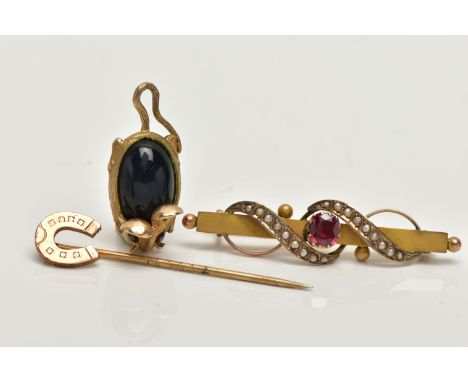 AN EARLY 20TH CENTURY BROOCH, A PENDANT AND A STICK PIN, the brooch set to the centre with a cushion cut ruby, flanked with s