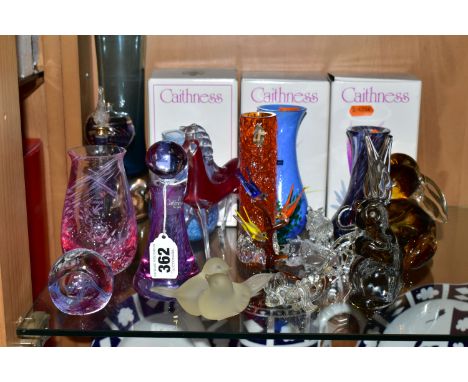 A COLLECTION OF CAITHNESS AND COLOURED GLASSWARES, comprising a Caithness 'Moon Crystal' paperweight, three boxed Caithness v