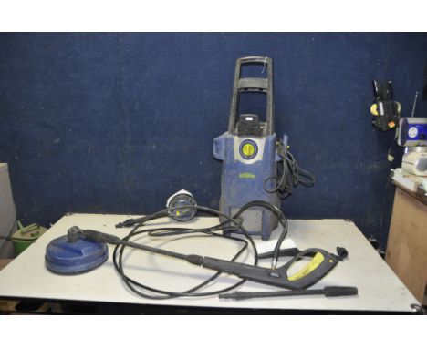 A CHALLENGE XTREME POWER WASHER with patio, brush, rotary brush and standard lance with tatty box (PAT pass and working)