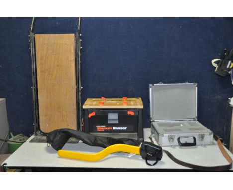 A HAKUBA ALUMINIUM CAMERA CASE, a Black and Decker WM450 Workbox, a Black and Decker Sack Truck and a Stoplock Pro steerin wh