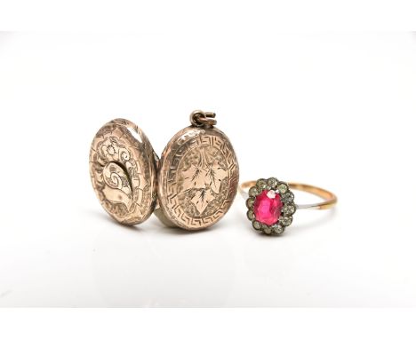 A LOCKET AND A RING, the gold front and back, oval hinged locket with floral pattern and vacant cartouche, opens to reveal tw