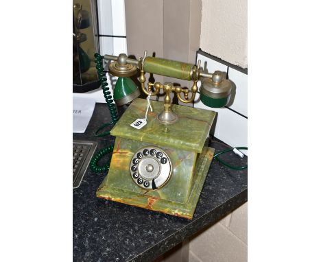 A GREEN ONYX TELEPHONE, label to base reads 'Onix Telephone, Pietrasanta, Made in Italy', rotary dial, handset attached with 