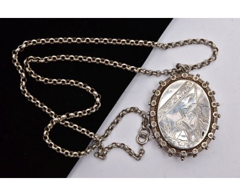 A LOCKET WITH CHAIN, oval locket detailed with a bird and foliage, applied bead work to the rim, opens to reveal two photo co