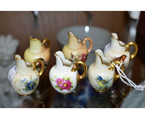 SIX ROYAL WORCESTER MINIATURE JUGS, three painted with British Birds - Bull Finch, Blue Tit and Robin, and three painted with