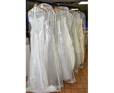 FOURTEEN WEDDING DRESSES, retail stock clearance (some may have marks or very light damage) varying in sizes and styles (15)