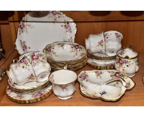 TWENTY SEVEN PIECES OF ROYAL ALBERT COTTAGE GARDEN TEA AND DINNER WARES, comprising a cake plate, a preserve pot, a leaf shap