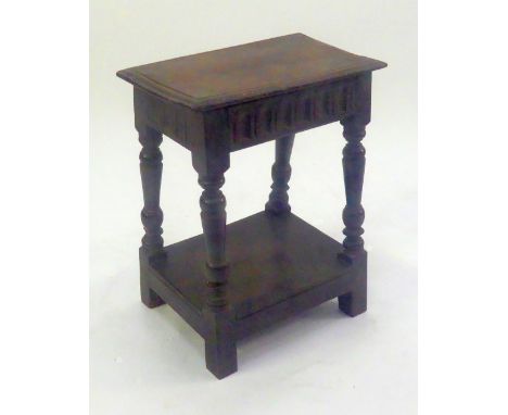 EIGHTEENTH CENTURY AND LATER OAK JOINT STOOL, the moulded oblong seat with later hinges, above a thumb arcaded frieze and rai