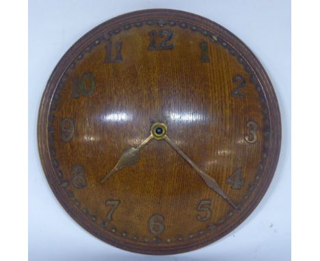 ZENITH 18 DAY OAK WALL CLOCK, of convex form with Arabic numerals in brass and keywind to the centre, the backplate stamped w
