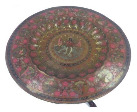 INDIAN ENGRAVED AND COLD PAINTED BRASS CIRCULAR TRAY TOP COFFEE TABLE, with dished centre, decorated with figural panels and 