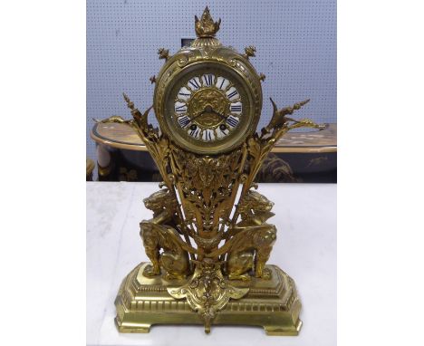 IMPRESSIVE LATE NINETEENTH CENTURY GILT BRASS MANTEL CLOCK, the 5 1/2" twelve piece enamelled Roman dial powered by an eight 