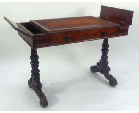 VICTORIAN CARVED MAHOGANY WRITING TABLE, the moulded oblong three section top comprising; fixed central oblong section (lacki