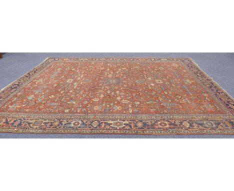 LARGE SEMI ANTIQUE PERSIAN CARPET, with elaborate pole medallion and all-over stylized floral pattern with blue and white str