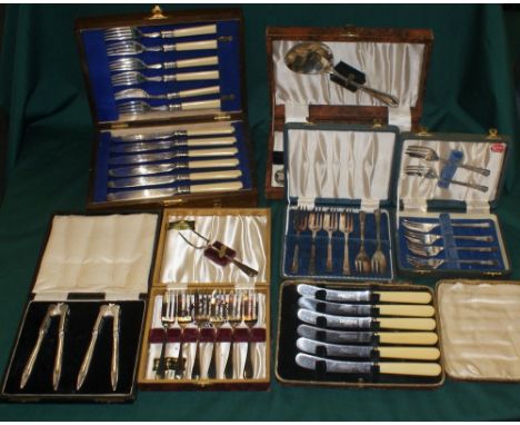 7 cased cutlery sets and nut cracker set