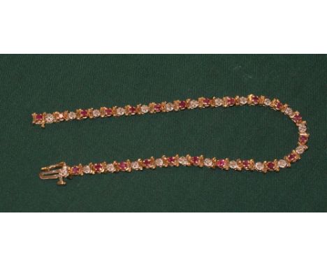 9ct Gold fully hallmarked diamond and Ruby bracelet, 19.5cm, 6.71 Grams