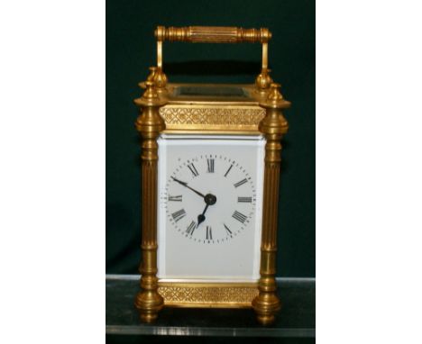 Late 19th / early 20th century Brass carriage clock with ormolu cut brass decoration, currently in working order, no major da