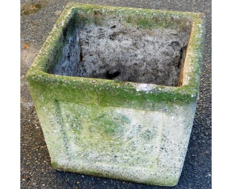 A late 20thC garden planter, of square tapering form, raised with panels of floral rosettes, 30cm high, 37cm wide, 37cm deep.