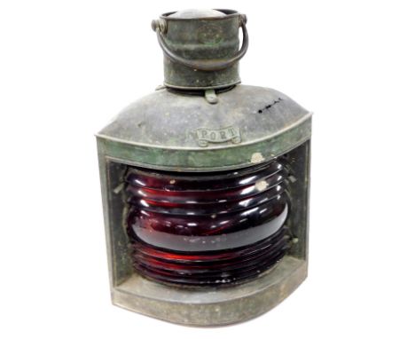 An early 20thC S Fay and Sons corner port light, with red glass centre and shaped case with cylindrical top and swing handle,