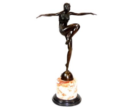 After Philipp. An Art Deco style bronzed and marble finish figure of dancing girl with arms outstretched and knee raised, on 