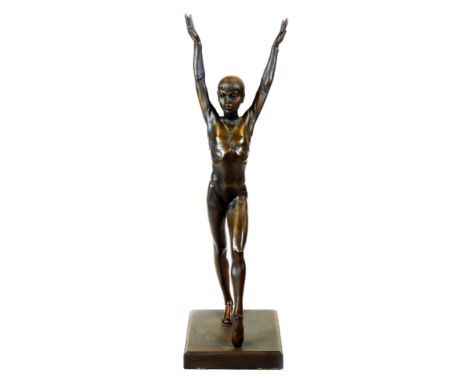 After Hromych. A bronzed Art Deco figure of a lady or ballerina, with arms raised, on a plain rectangular base, signed, 42cm 