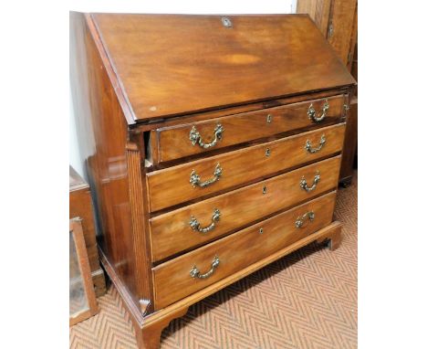 An 18thC mahogany bureau, the plain fall with oval lock revealing a fitted interior with central cupboard flanked by columns,
