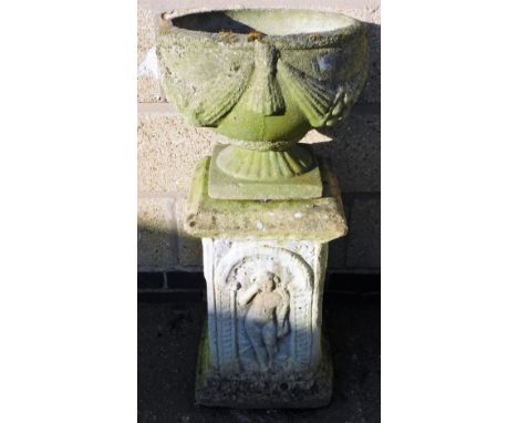 A late 20thC classical design planter, of circular form, on a square base with a separate plinth raised with classical figure