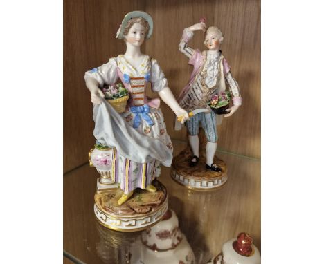 Pair of Early German Continental Porcelain Figures with a Dresden Region Pottery mark to base, possibly Meissen