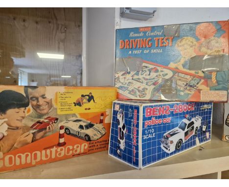 Boxed Merit Driving Kit Toy Game, Hong Da 280CE Police Car, plus Computacar Game