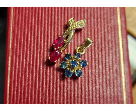 Pair of 9ct Pendants - one Ruby and the other Tanzanite - 2.8g
