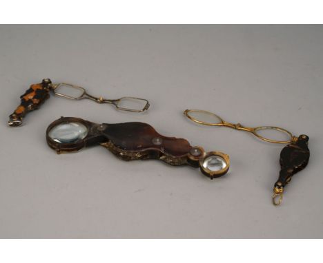 Pair of Lorgnettes, both unsigned with faux tortoise shell covers, with a horn pocket magnifier, one lorgnette missing a lens