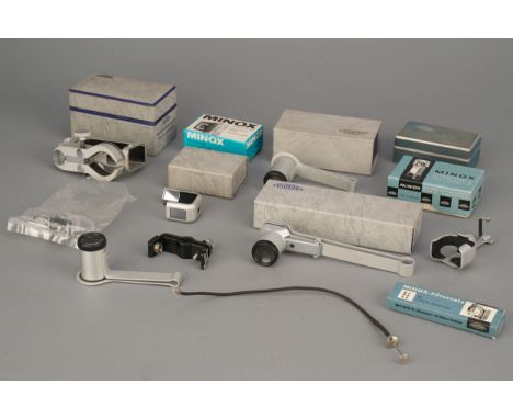 A Selection Minox Accessories, including tripod adapters, right angle finder and more, some boxed (a lot)