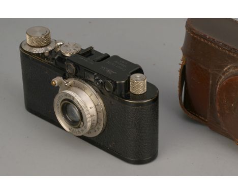 A Leica II Rangefinder Camera, black, serial no. 76480, with Leitz Elmar f/3.5 50mm lens, in maker's case, some haze and ligh