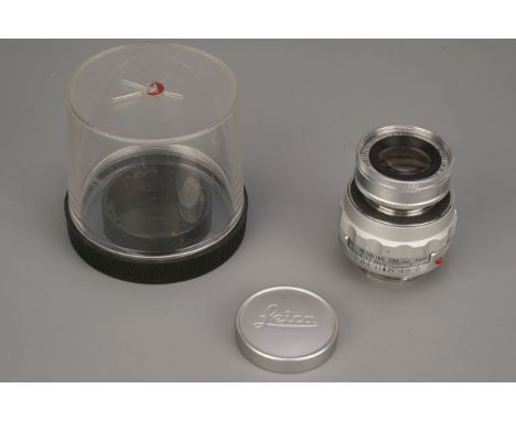 A Leitz Elmar f/4 90mm Lens, collapsible, serial no. 1461589, with caps and bubbleImport DutyThese items have been brought in
