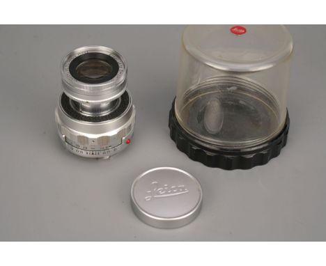 A Leitz Elmar f/4 90mm Lens, collapsible, serial no. 1459977, with caps and bubbleImport DutyThese items have been brought in
