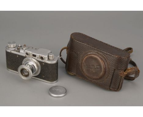 A FED Rangefinder Camera, chrome, serial no. 134552, with FED f/3.5 50mm lens, in maker's case