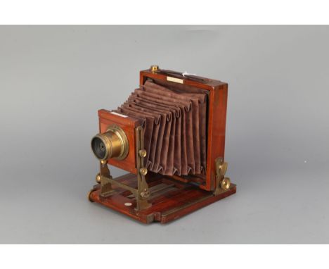 A J. Lancaster &amp; Sons 1900 Extra Special Patent Half Plate Mahogany Field Camera, with Lancaster's Patent f/10 brass lens