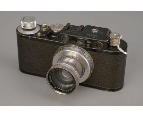 A Leica II Rangefinder Camera, black, serial no. 80213, with Leitz Summar f/2 50mm lens, film advance spindle loose, shutter 