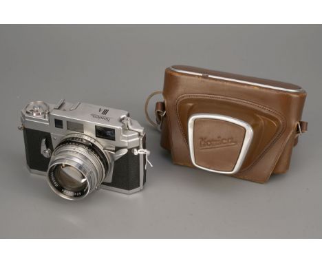 A Konica IIIA Rangefinder Camera, with Konishiroku Hexanon f/1.8 50mm lens, in maker's caseImport Duty These items have been 