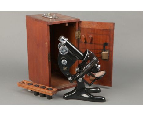 A Military Compound Microscope by Beck, engraved to the side 'London Model 29 R &amp; J Beck Ltd, London 11615' with military