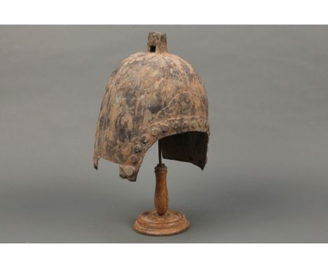 Chinese Zhou Dynasty Helmet, A Chinese bronze helmet in Zhou Dynasty style: with ribbed and 'rivet' detailing and pierced rec