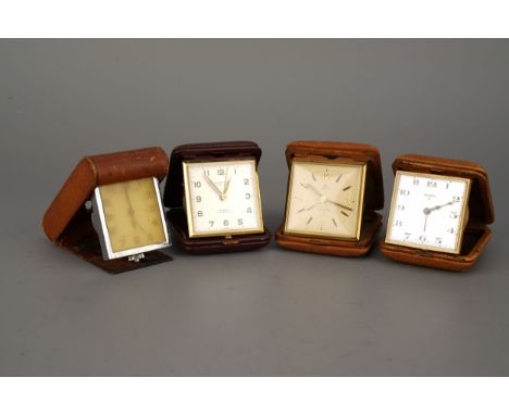 A Jaeger Lecoultre Traveling Clock, together with three others by Smiths, Looping and Swiza, untested (4)